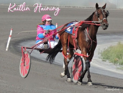 Kaitlin Haining, pictured in the race bike at Century Downs with Bout That Base