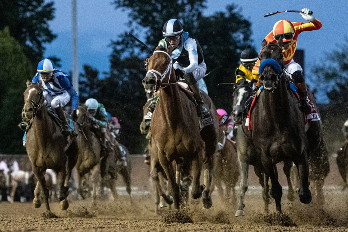 Horses duel on the front stretch at Churchill Downs in the 2026 Kentucky Oaks. May 1, 2026 
